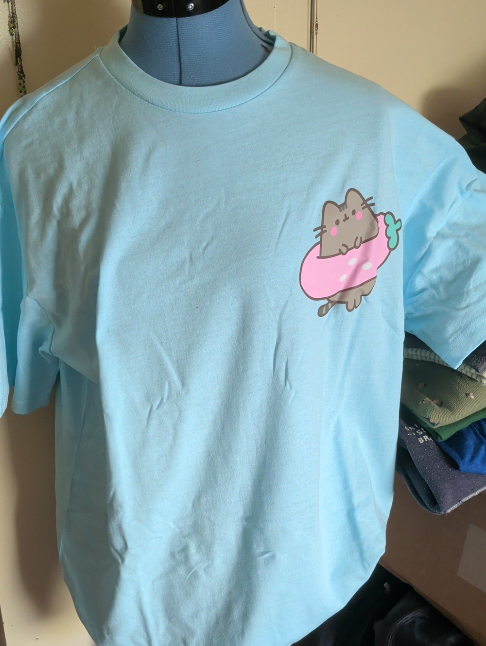 Pusheen Light Blue Cat Graphic Tee - Playful Donut Design